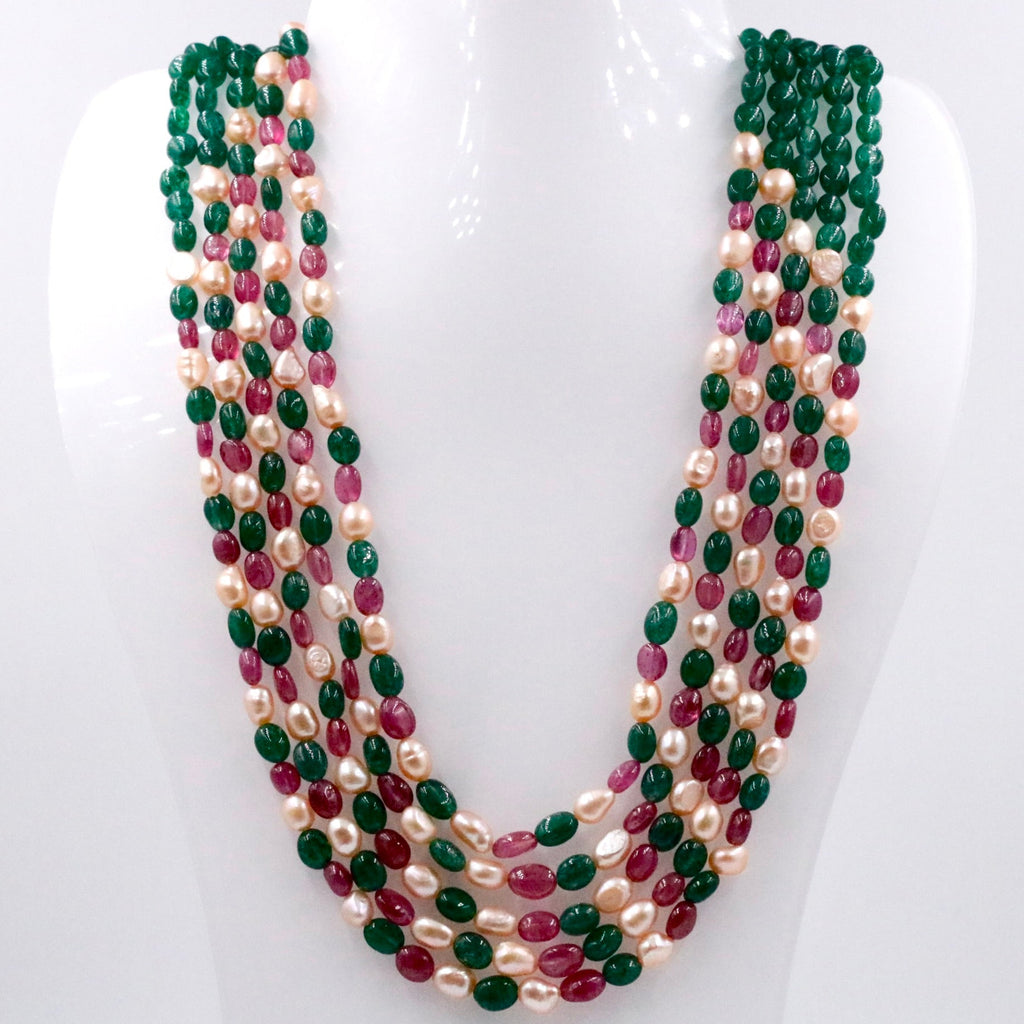 Multi-gemstone layered necklace featuring aventurine, quartz, and ruby beads