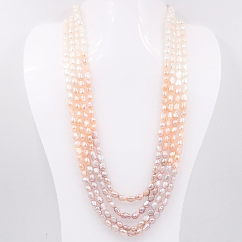 Shaded pearl necklace with multi-strand beaded arrangement