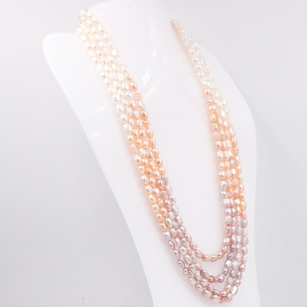 Cultured pearl necklace with layered strands and Indian styling