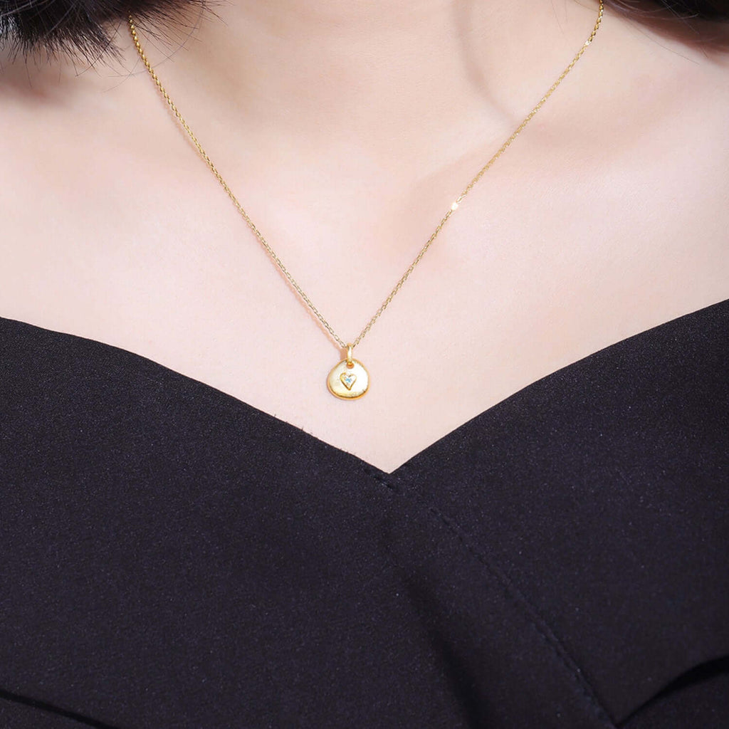 woman wearing 18k Gold Plated Charm Necklace 